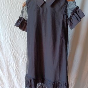 Black dress with lace details. Short sleeved Shein with collar Size